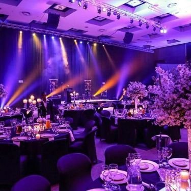 Corporate event space with stage lighting